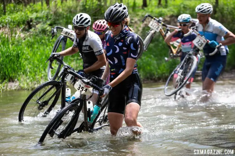 The creek crossing is a memorable part of the Almanzo race. 2018 Almanzo 100 Gravel Race. © Eric Wynn