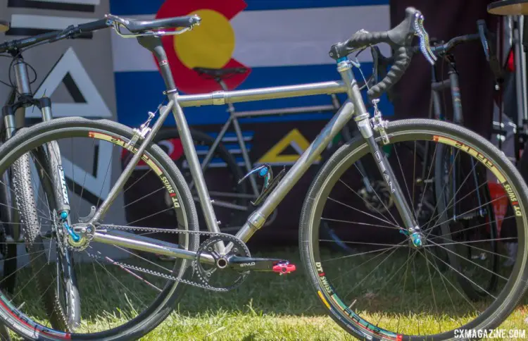 Dean founder John Siegrist's titanium travel bike combines new tech with old tech. Center pull calipers, Wound Up carbon fork and Gates belt drive with S&S titanium couplers. 2018 Sea Otter Classic cyclocross and gravel new products. © Cyclocross Magazine