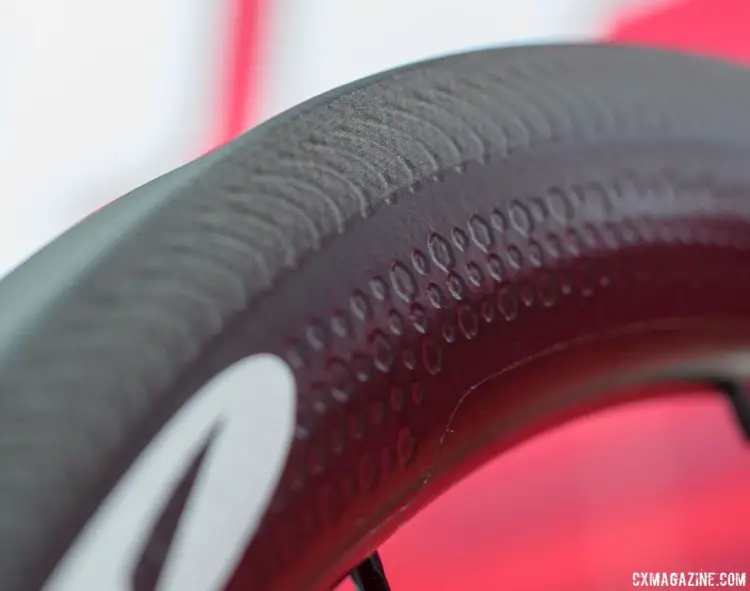 Rim brake or disc brake, the new Zipp 303 Firecrest tubular rim is said to be stronger with marginal weight gains. Both versions inherit the company's new Sawtooth dimple pattern. 2018 Sea Otter Classic cyclocross and gravel new products. © Cyclocross Magazine