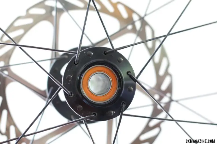 Pop the caps off the hub and you'll see the sealed cartridge bearings. Stan's NoTubes Grail CB7 carbon tubeless wheelset for gravel and cx. © Cyclocross Magazine