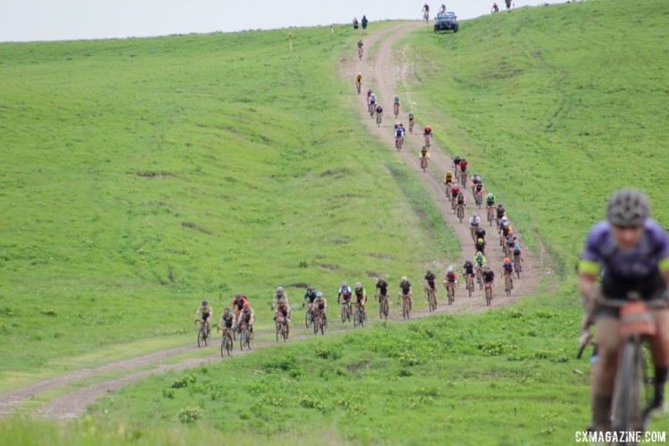 Riders roll down a descent near mile 20 that is popular with the media folks. 2018 Dirty Kanza 200. © Z. Schuster / Cyclocross Magazine