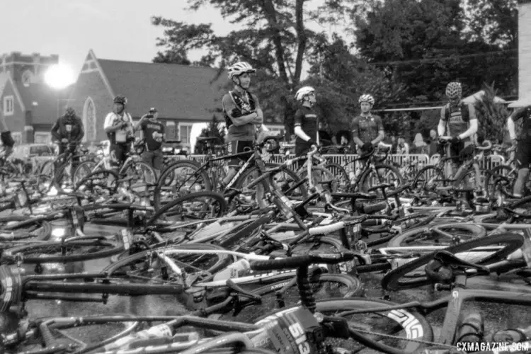 One by one, riders ventured out from their rain shelter and back to their bikes during the 30-minute delay before the start. 2018 Dirty Kanza 200. © Z. Schuster / Cyclocross Magazine