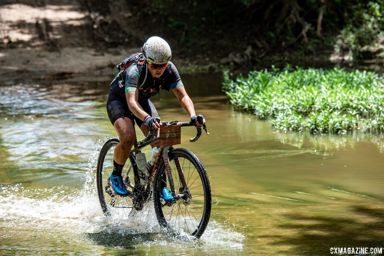 Amanda Nauman splashes her way through a shallow crossing en route to finishing second. 2018 Dirty Kanza 200. © Ian Matteson/ ENVE Composites