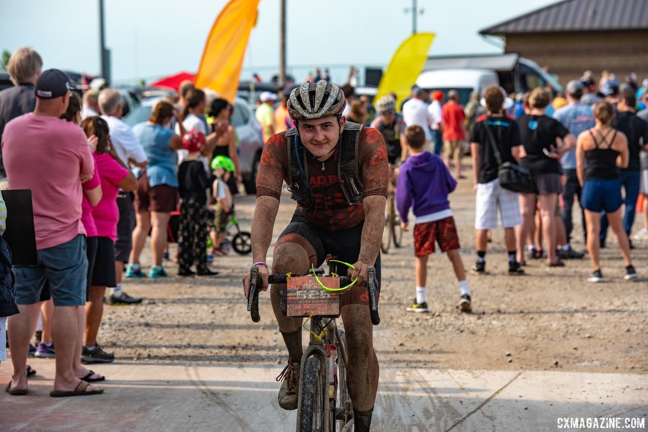 The checkpoints are a always a big production at the DK200. Here, a rider makes his way through CP1. 2018 Dirty Kanza 200. © Ian Matteson/ ENVE Composites