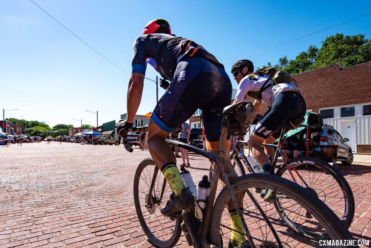 Riders head into Checkpoint 3 in Madison to fuel up for the last leg of the ride. 2018 Dirty Kanza 200. © Ian Matteson/ ENVE Composites