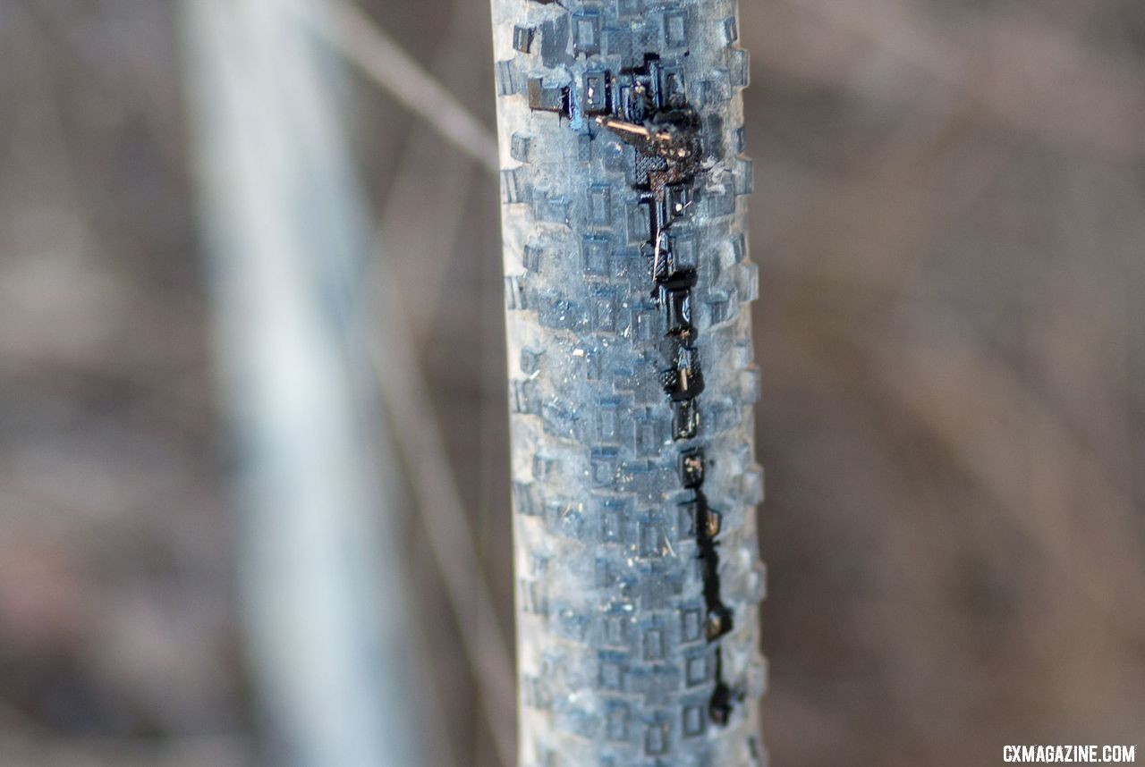 Katerina Nash attempted to plug her cut in the Maxxis Rambler tire but had to eventually resort to a tube. 2018 Lost and Found gravel race. © Cyclocross Magazine