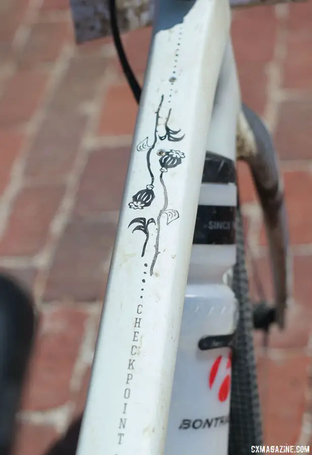 Nys' white bike had some impressive ink done. Note the two bag mounts near the head tube. Sven Nys' 2018 Dirty Kanza 200 Trek Checkpoint. © Z. Schuster / Cyclocross Magazine