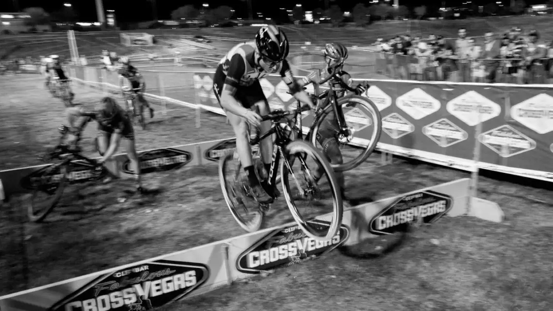 Ellen Noble hops the barriers while other earthbound riders struggle around her. 2017 CrossVegas. © A. Yee / Cyclocross Magazine