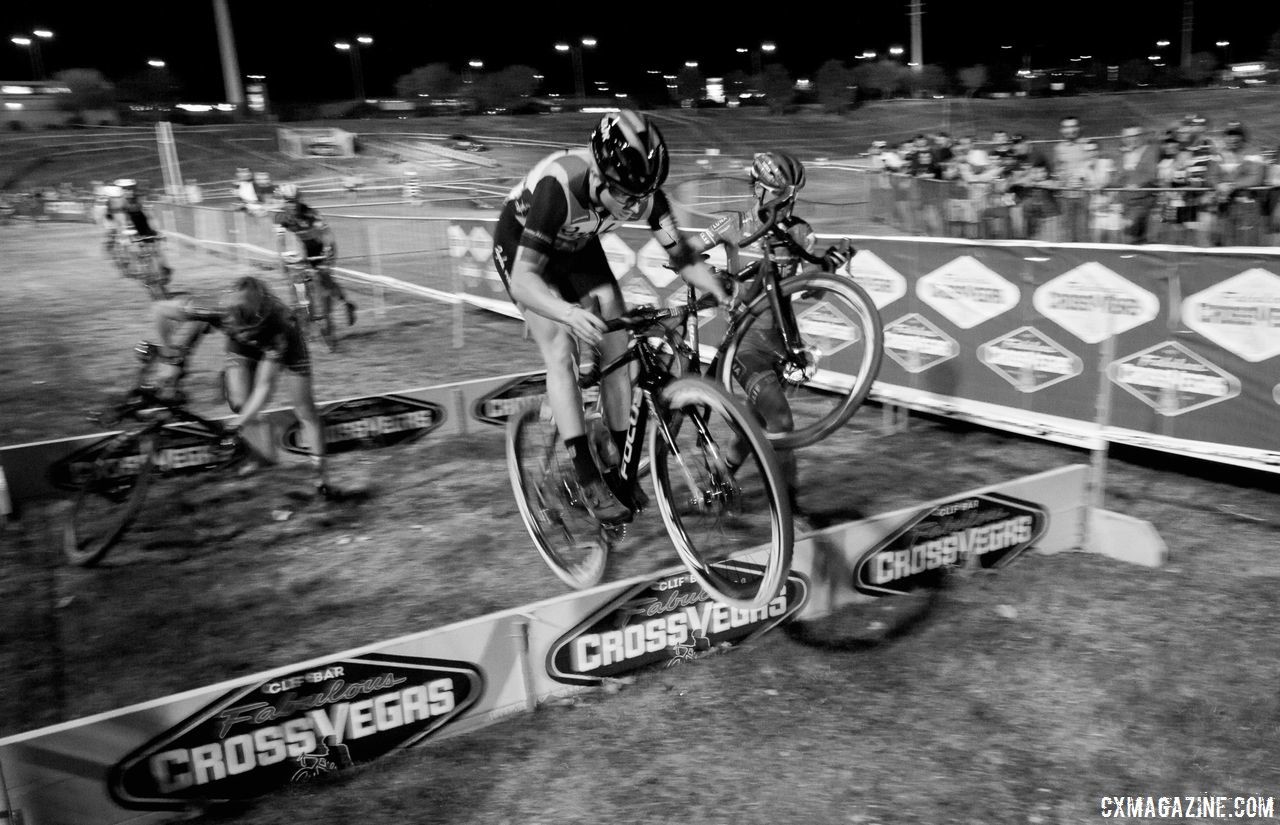 Ellen Noble hops the barriers while other earthbound riders struggle around her. 2017 CrossVegas. © A. Yee / Cyclocross Magazine