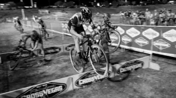 Ellen Noble hops the barriers while other earthbound riders struggle around her. 2017 CrossVegas. © A. Yee / Cyclocross Magazine