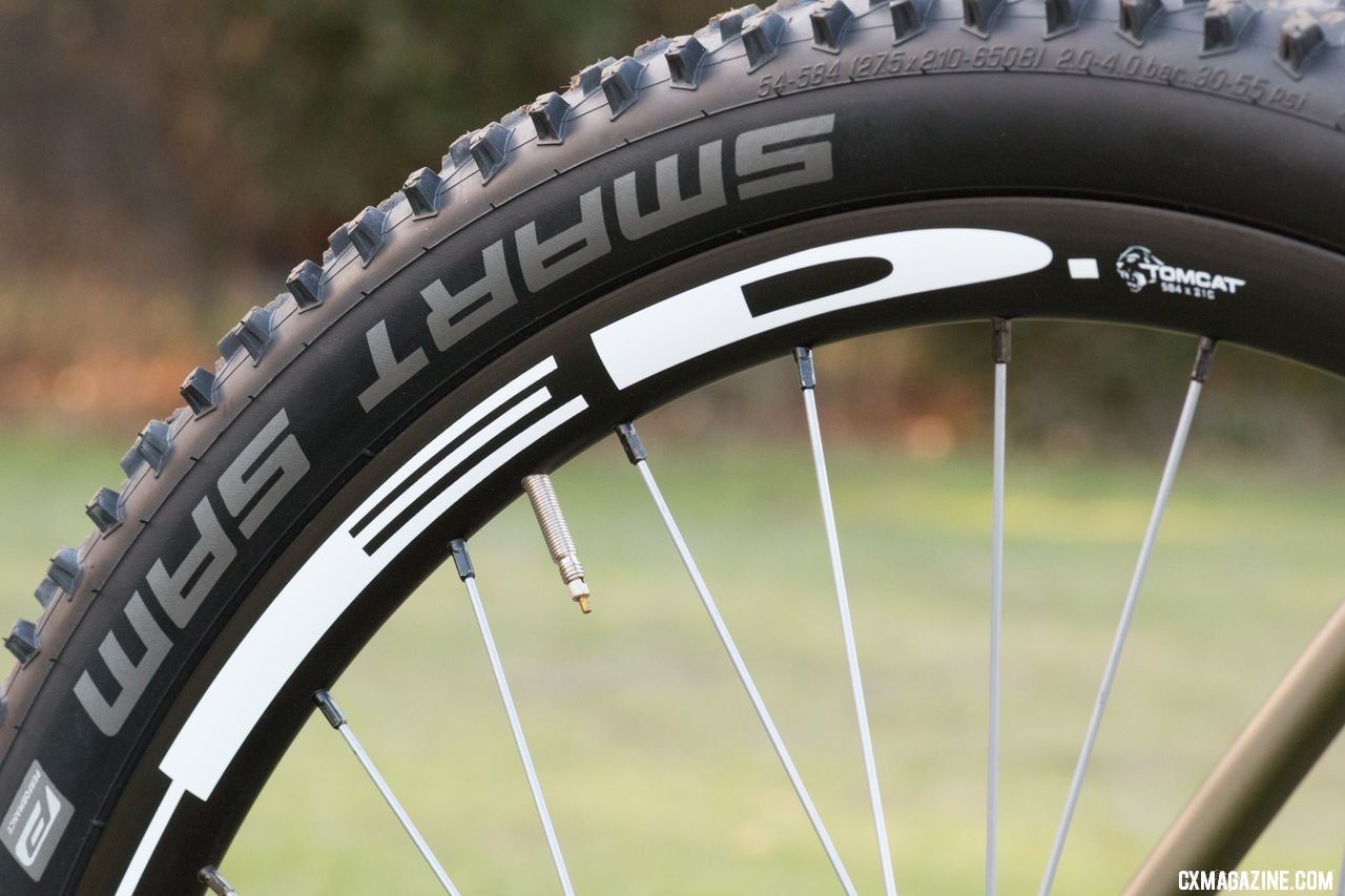 Schwalbe Smart Sam 27.5x2.1 tires on HED Tomcat rims are standard, and make for a wide contact patch for plenty of traction off-road, but generate tremendous buzz on the pavement. Diamond Back carbon Haanjo EXP, with 650b wheels. © Cyclocross Magazine