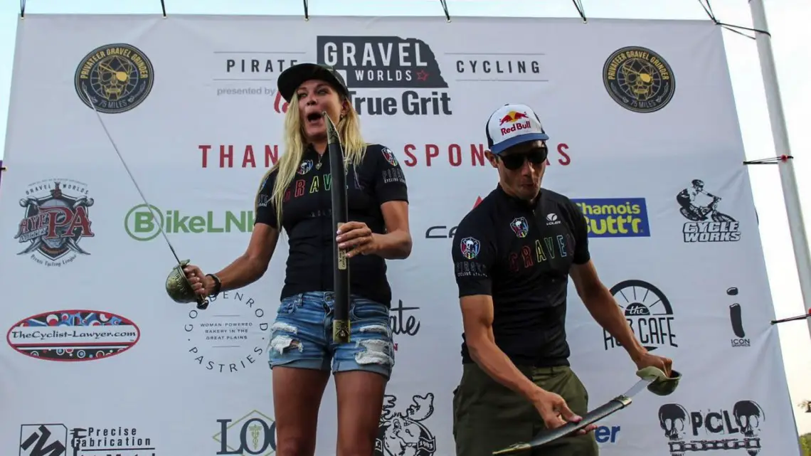 Alison Tetrick and Colin Strickland show off their winner's cutlasses. 2018 Gravel Worlds © Z. Schuster / Cyclocross Magazine