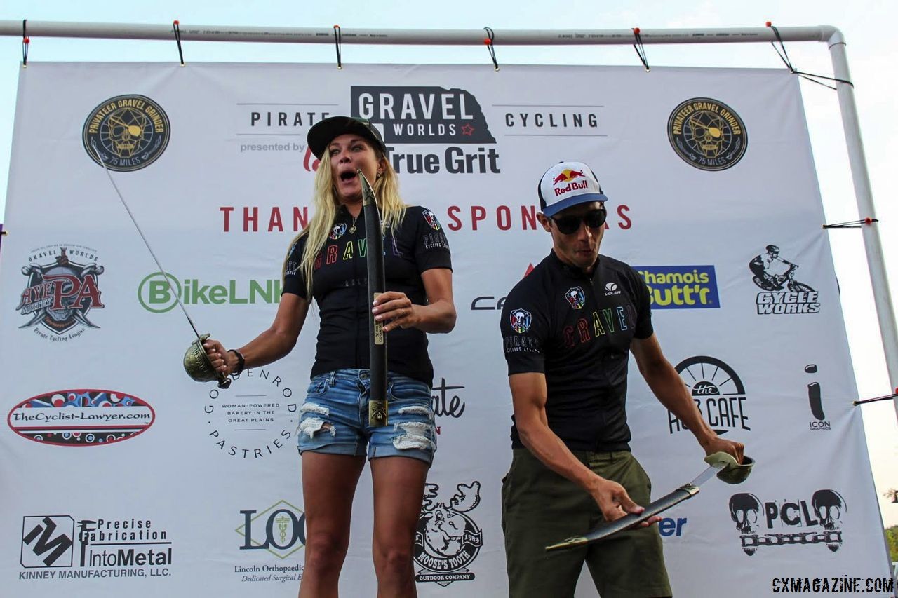 Alison Tetrick and Colin Strickland show off their winner's cutlasses. 2018 Gravel Worlds © Z. Schuster / Cyclocross Magazine