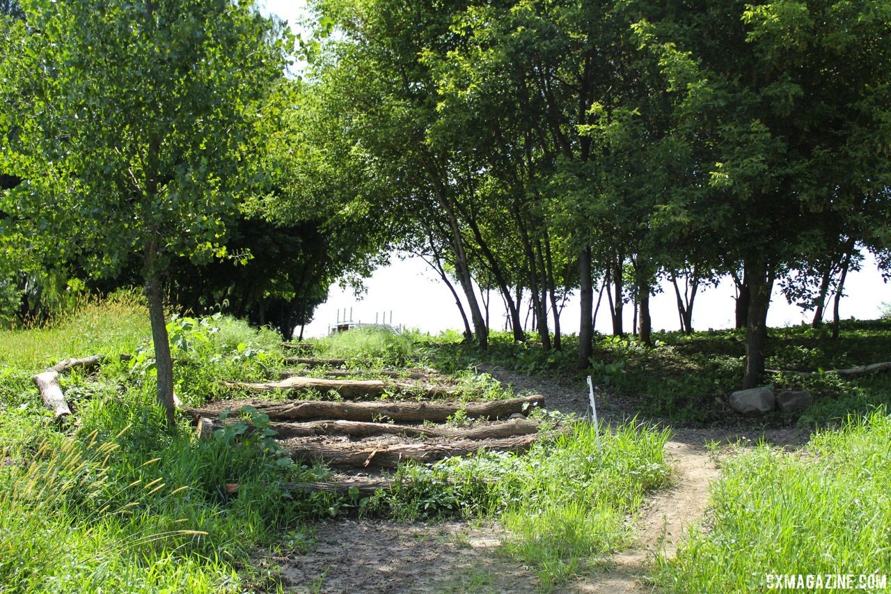 The logs were a popular spectating spot last year. The riding line to the right will not be open on race day. 2018 World Cup Waterloo Course Preview © Z. Schuster / Cyclocross Magazine