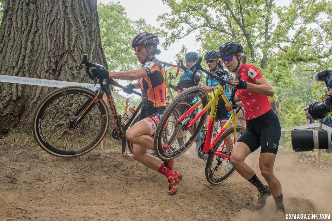 Arley Kemmerer and Maghalie Rochette found themselves in a scrum early in Saturday's race. 2018 Rochester Cyclocross. © Evan Grucela
