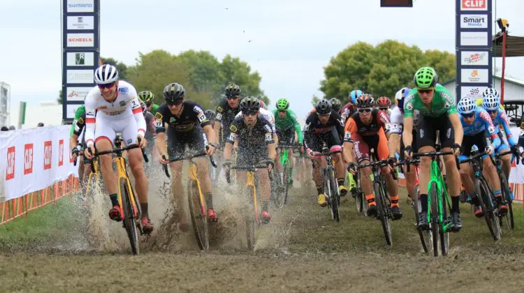 The men make a splash on their way to tackling Mt. Krumpit and putting on a show. 2018 Jingle Cross. © D. Mable / Cyclocross Magazine