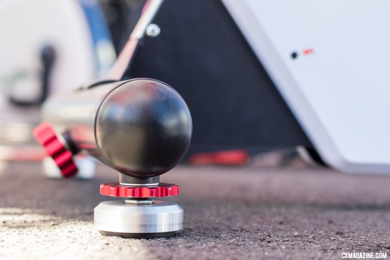Minoura's Kagura SmartTurbo trainer features independently adjustable legs for a level ride on uneven surfaces. 2018 Interbike new products. © Cyclocross Magazine