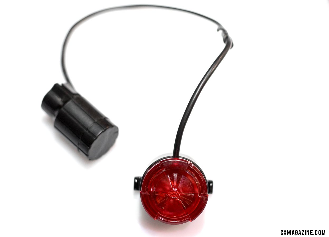 The man behind the Clever Standard tire levers and chain breaker tools is now partnering with KHS Bicycles to distribute the new XBat-M rear flashing light the is powered by any metal rim, without touching the rim. 2018 Interbike new products. © Cyclocross Magazine