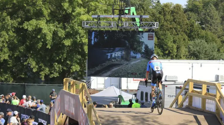 Big screens helped fans (and maybe racers) keep tabs on the front of the race. 2018 World Cup Waterloo. © D. Mable / Cyclocross Magazine