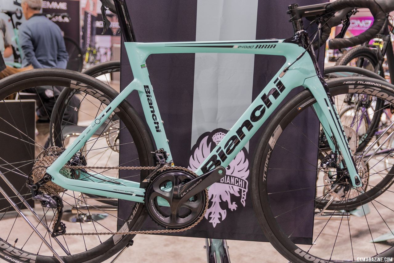 The Bianchi E-Road Aria. A carbon disc road bike with a hub-centric motor and seat-tube battery: 25 pounds total weight, $6,500 USD. Bianchi Orso, Impulso All Road and E-Road Aria, Interbike 2018. © C. Lee / Cyclocross Magazine