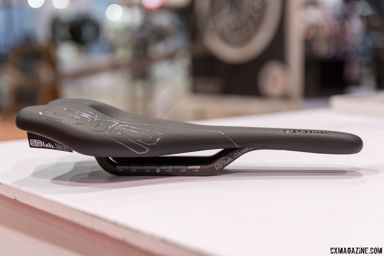 SQ Labs' saddle has a slight rise at the back and a deep central channel. The carbon rail version is only 142 grams. 2018 Interbike Contact Point Product Round-Up. © C. Lee / Cyclocross Magazine