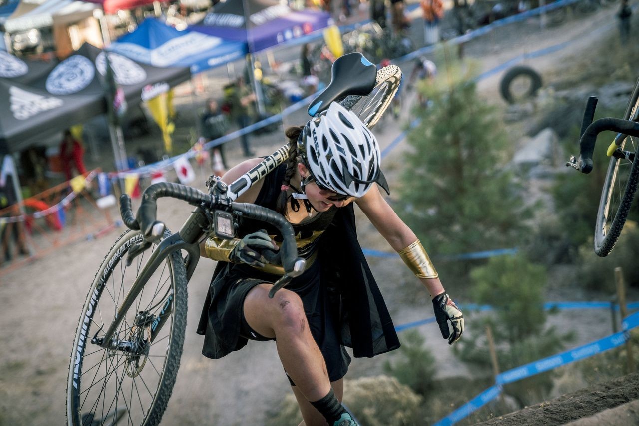 Batwoman conquers the railroad ties. 2018 Cyclocross Crusade Halloween Race at Deschutes Brewery, Bend, OR. © Ben Guernsey