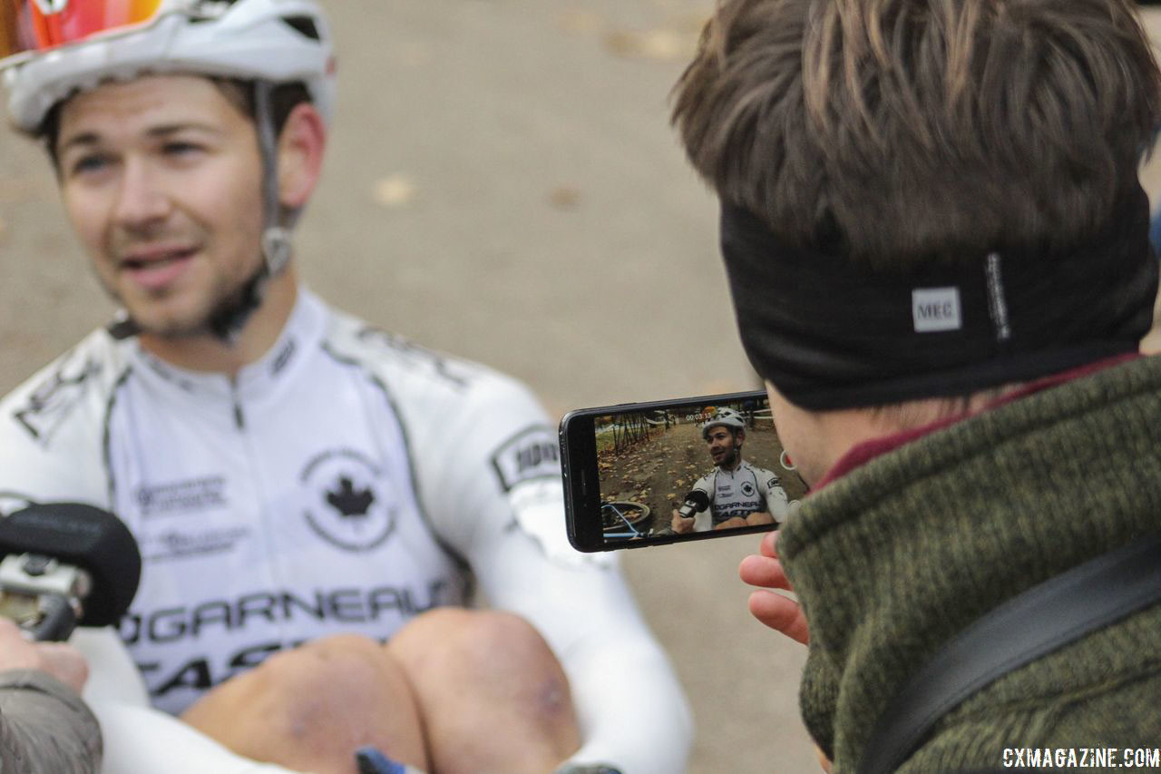 Michael van den Ham talks to reporters after his narrow second-place finish. 2018 Pan-American Cyclocross Championships, Midland, Ontario. © Z. Schuster / Cyclocross Magazine