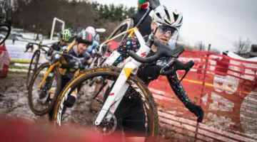 Ruby West shoulders her bike. 2018 Rockland County Supercross Cup Day 2. © Angelica Dixon