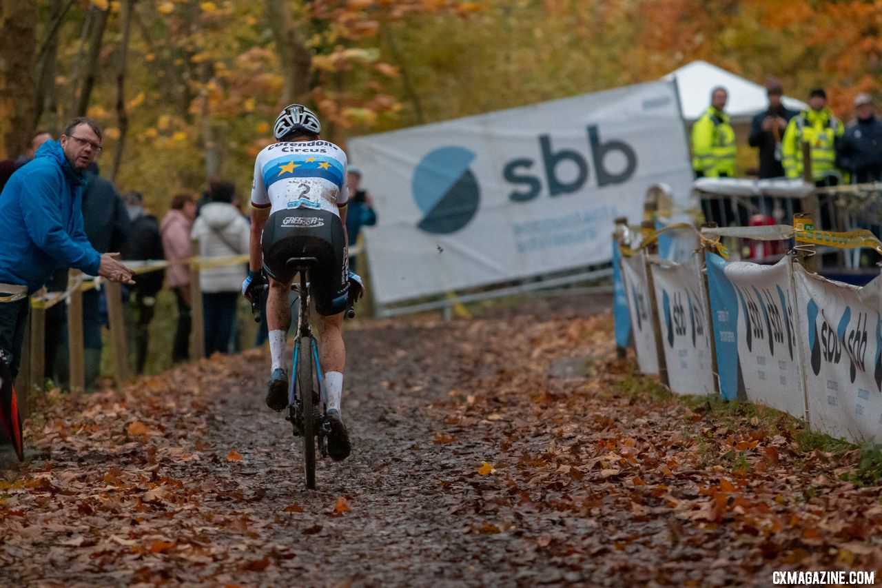 Mathieu van der Poel, with under two laps to go, enjoys a quiet ride with a single fan cheering on the course's bottom half. It was eerily quiet when the champ circled the course late in the race. 2018 Superprestige Gavere Men. © A. Yee / Cyclocross Magazine