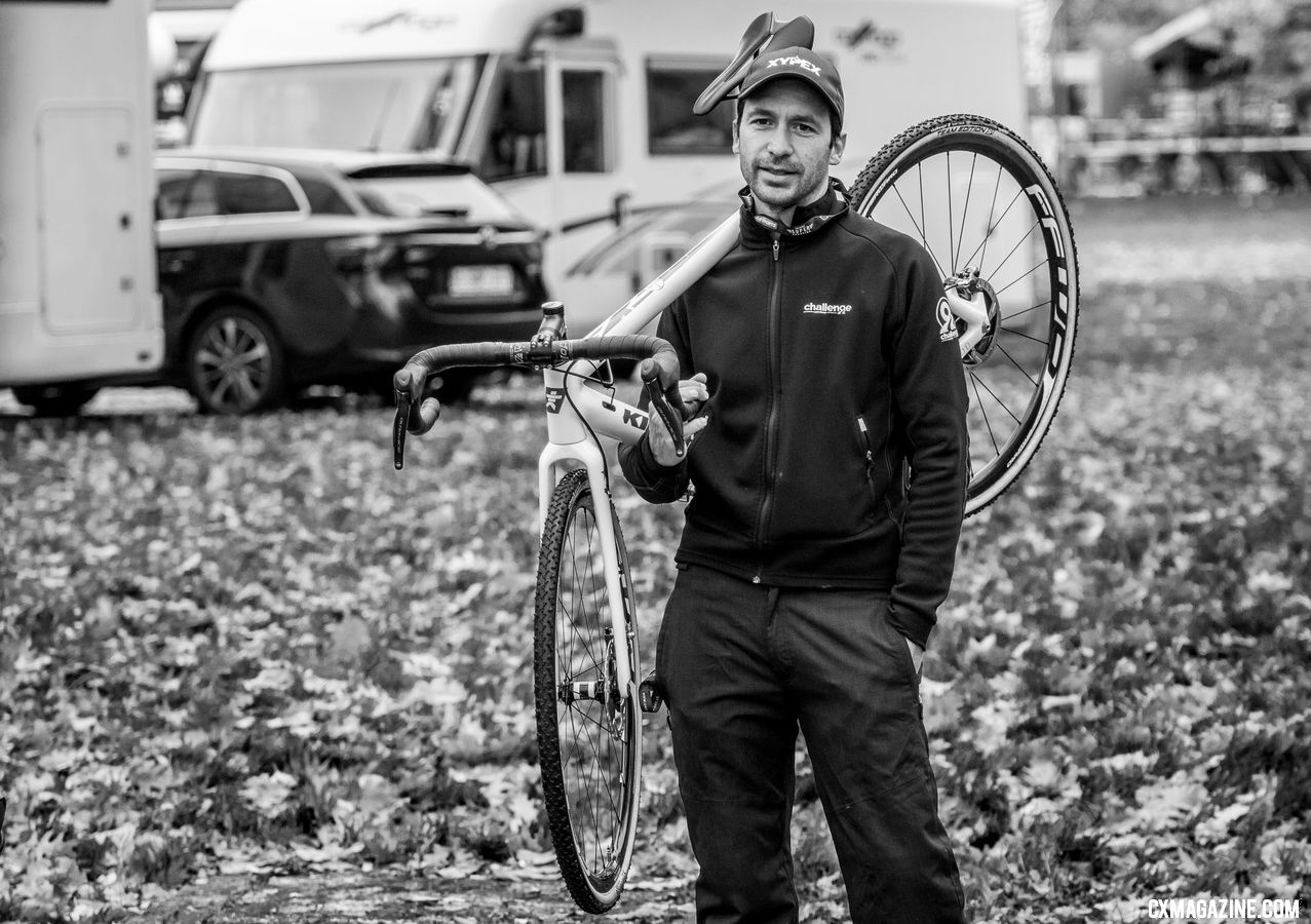 It's not just dads. Helen Wyman's husband Stef heads to the pit. European cyclocross is a family affair. 2018 Superprestige Gavere. © A. Yee / Cyclocross Magazine