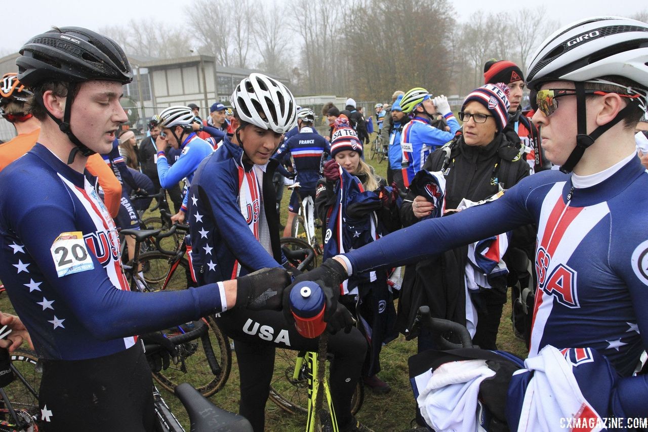 Riders share a fist bump after surviving the dunes of Koksijde. 2018 World Cup Koksijde. © B. Hazen / Cyclocross Magazine