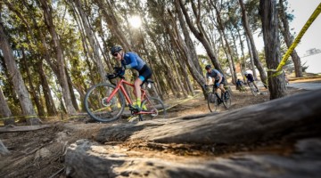 Riders go over an obstacle. 2018 Coyote Point Cyclocross Race 1, San Mateo, California. © J. Vander Stucken / Cyclocross Magazine