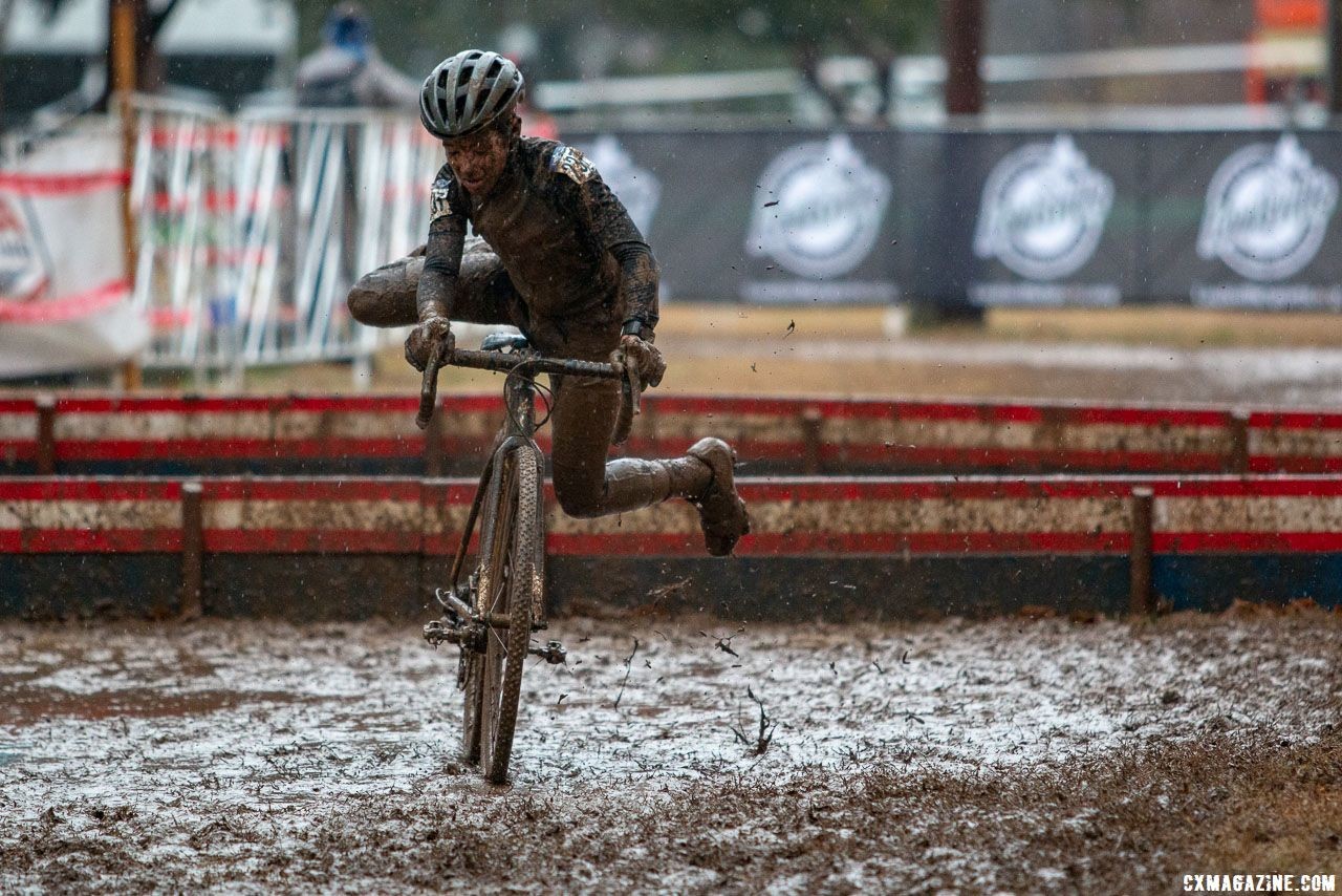With so much standing water getting enough speed to remount can be challenging. Junior Men 13-14. 2018 Cyclocross National Championships, Louisville, KY. © A. Yee / Cyclocross Magazine