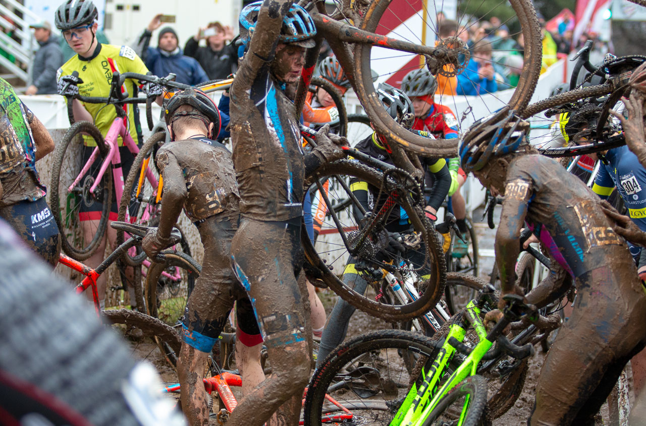 A crash immediately after the pavement created traffic. Junior Men 15-16. 2018 Cyclocross National Championships, Louisville, KY. © A. Yee / Cyclocross Magazine