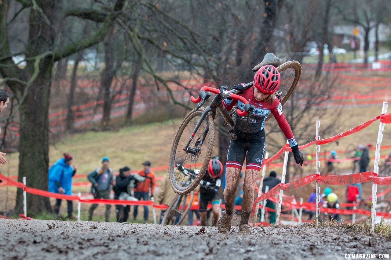 Riley Pearman shouldeed her bike to avoid accumulating mud. Junior Women 11-12. 2018 Cyclocross National Championships, Louisville, KY. © A. Yee / Cyclocross Magazine