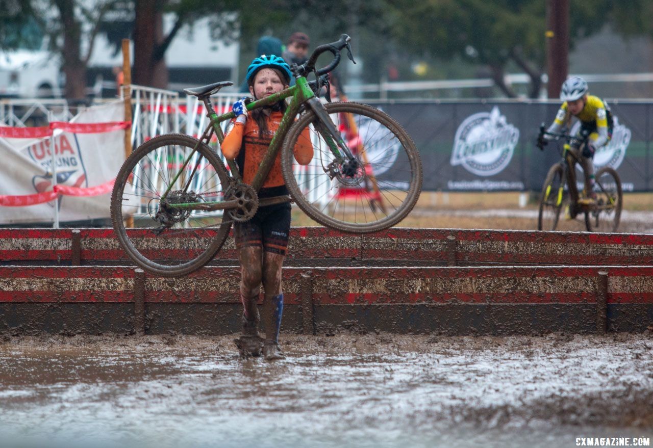 Some smaller riders had to shoulder their bike to clear the UCI height barriers. Junior Women 11-12. 2018 Cyclocross National Championships, Louisville, KY. © A. Yee / Cyclocross Magazine