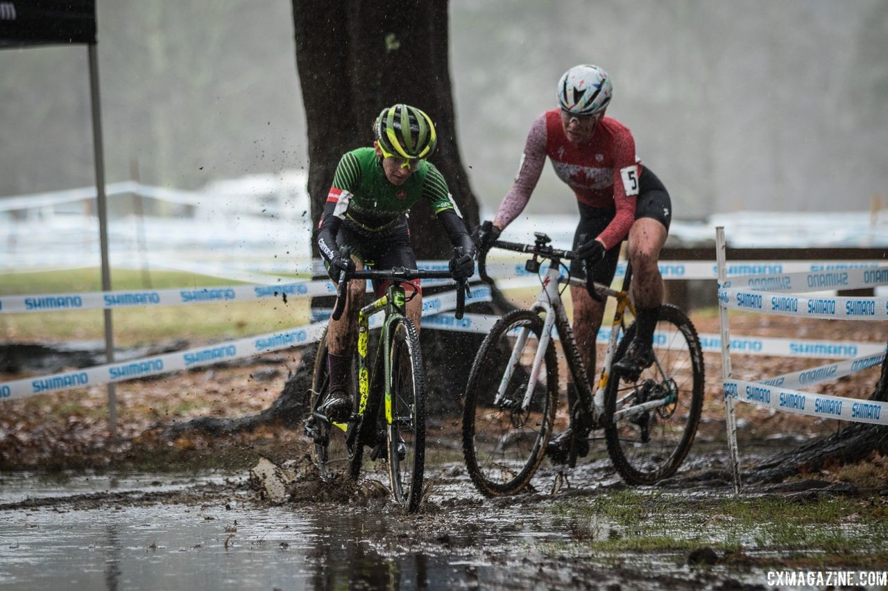 Kaitie Keough and Ruby West battle in the mud early. 2018 NBX Gran Prix of Cyclocross Day 2. © Angelica Dixon