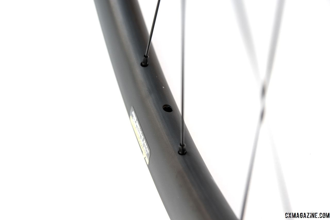 The tubeless-ready rims are laced with 24 Sapim j-bend spokes. Irwin AON GX 35 Carbon Tubeless Clincher Wheelset. © C. Lee / Cyclocross Magazine
