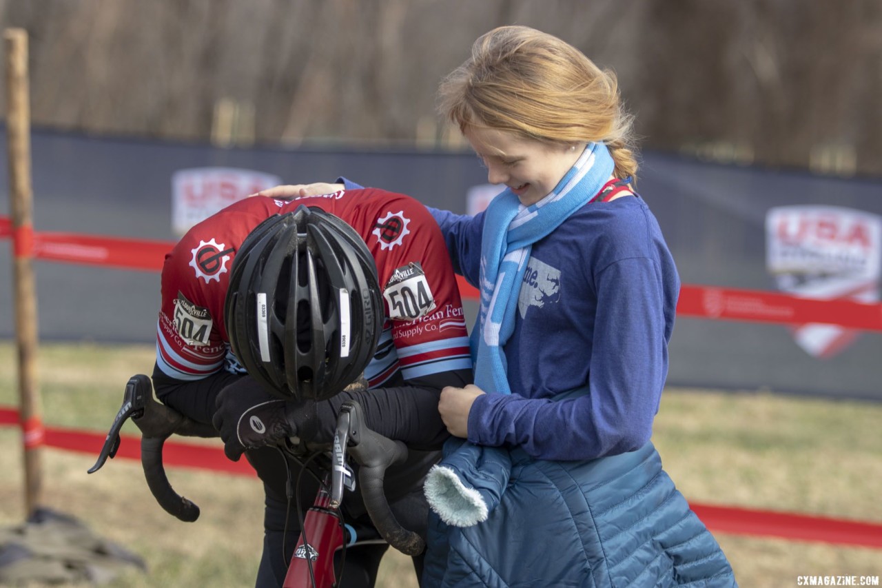 Paul McKeithan's grand daughter greets him after his win. Masters Men, 70+. 2018 Cyclocross National Championships, Louisville, KY. © A. Yee / Cyclocross Magazine