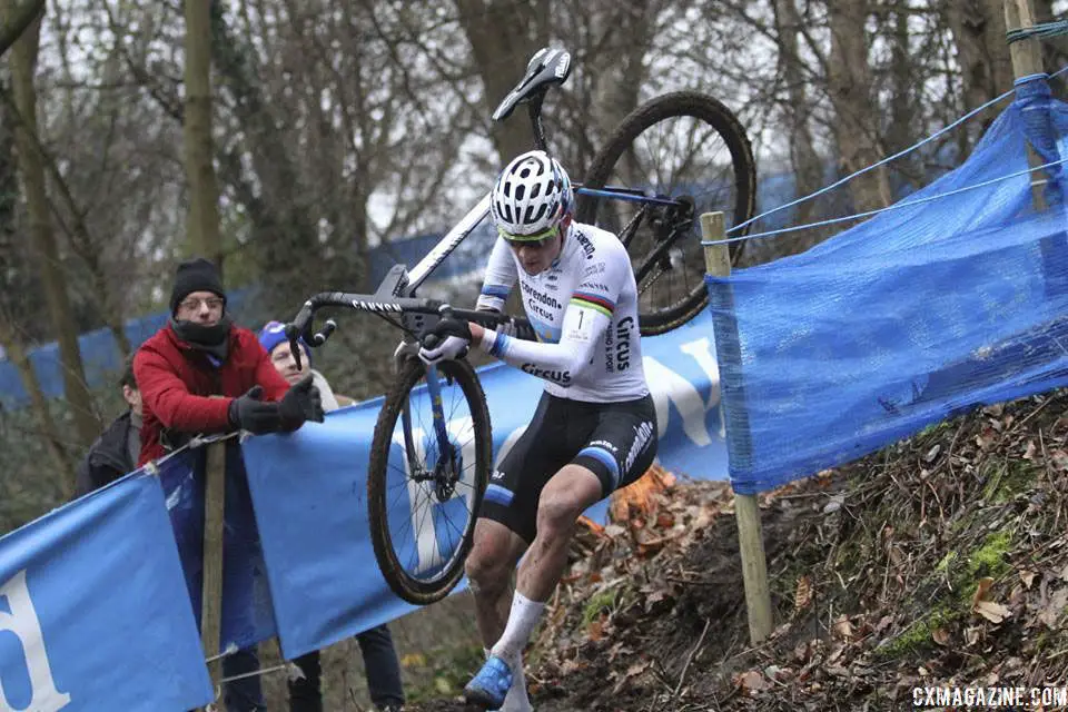 Mathieu van der Poel turns one of downhill corners in the woods. 2019 Brussels Universities Cyclocross. © B. Hazen / Cyclocross Magazine