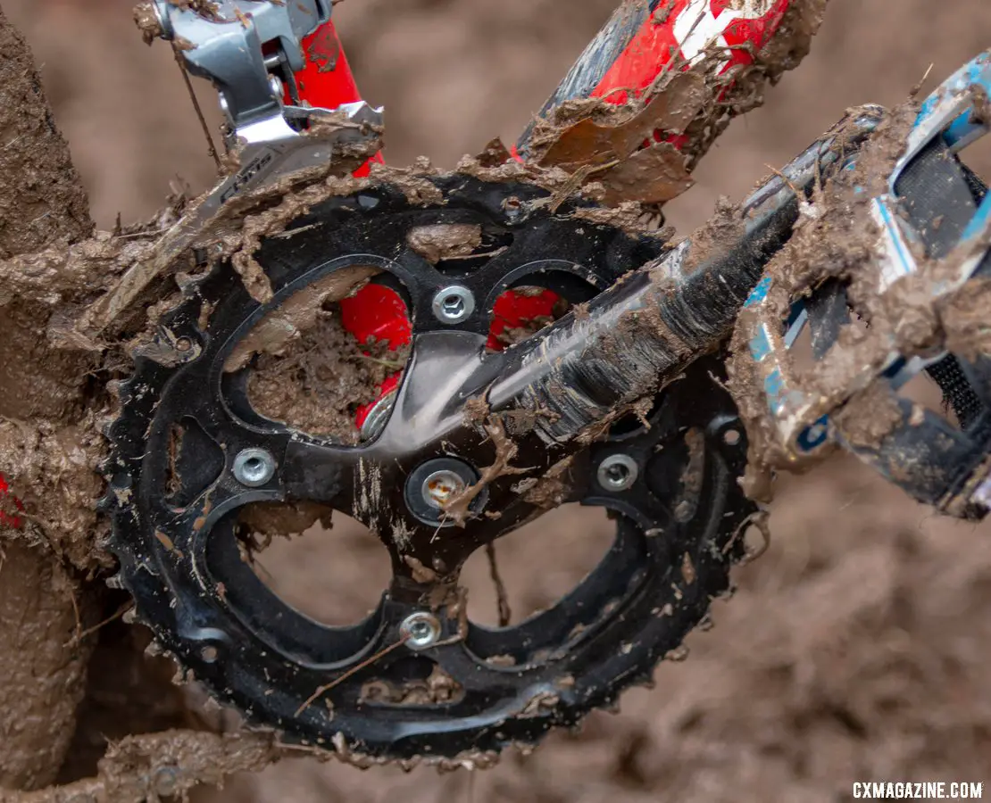 A Claris drivetrain with a Sugino double crankset featuring 38/48 chainrings provides plenty of gear inches for the strongest future champs despite the small wheels. Miller Reardon's Redline Conquest 24. 2018 Cyclocross National Championships, Louisville, KY. © A. Yee / Cyclocross Magazine