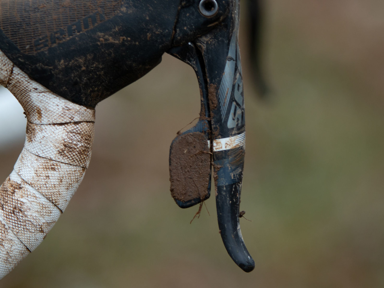 Mud at Nationals? His shifter paddle shows there was plenty. Stephen Hyde's title-winning Cannondale. 2018 Cyclocross National Championships V2. Louisville, KY. © Cyclocross Magazine