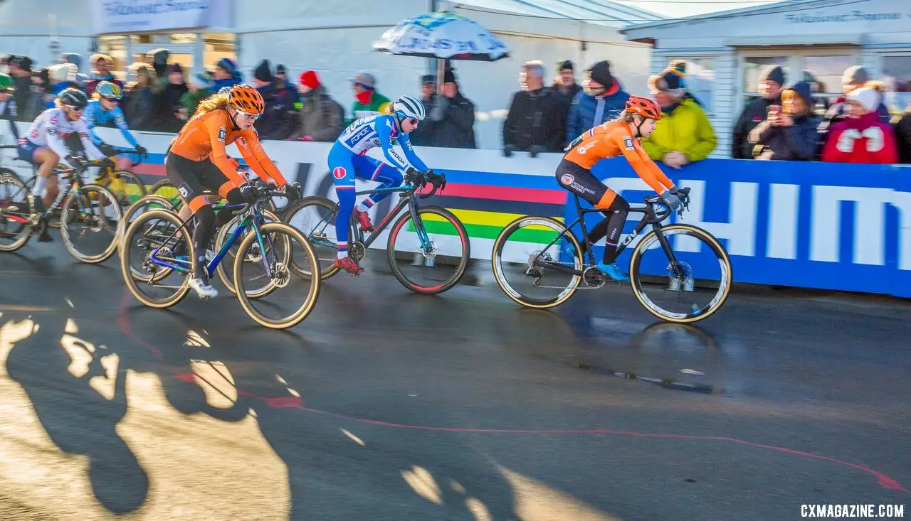 The pavement brought out pack racing, with many rejoining to seek shelter from the wind. U23 Women. 2019 Cyclocross World Championships, Bogense, Denmark. © K. Keeler / Cyclocross Magazine