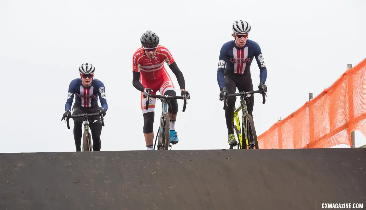 Spencer Petrov and Cooper Willsey sandwich a Danish rider on their way across a flyover. 2019 Cyclocross World Championships, Bogense, Denmark. © Cyclocross Magazine