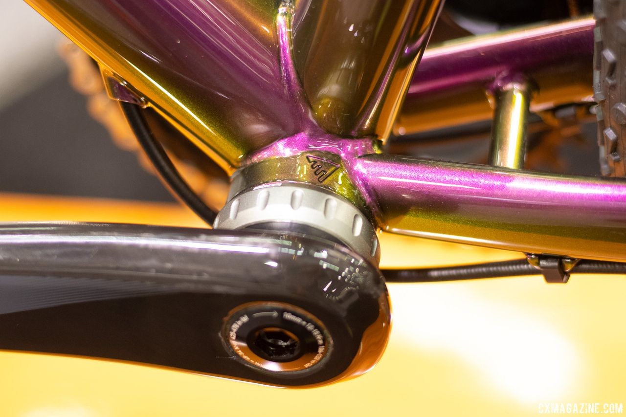 Enigma's logo subtly accents the bottom bracket. Enigma titanium cyclocross bike. 2019 NAHBS Sacramento. © A. Yee / Cyclocross Magazine