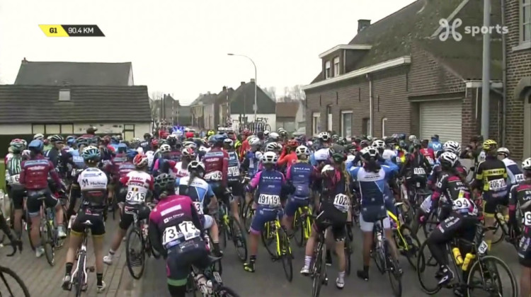 The entire Elite Women's peloton was halted in Sint-Denijs-Boekel for nearly 10 minutes. photo: Proximus Sports live stream