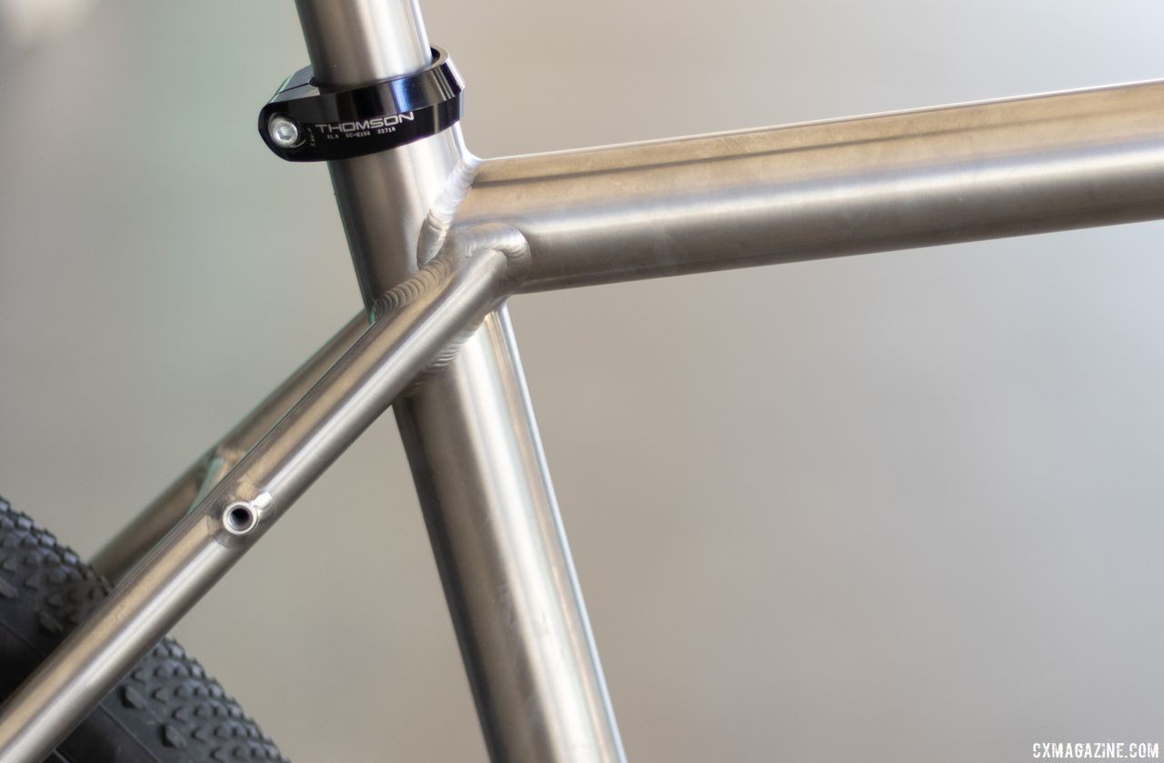 The clean metallic exterior allowed for a good look at the welding on the titanium frame. Thomson's Taiwan-built titanium gravel bike is coming soon. 2019 NAHBS Sacramento. © A. Yee / Cyclocross Magazine
