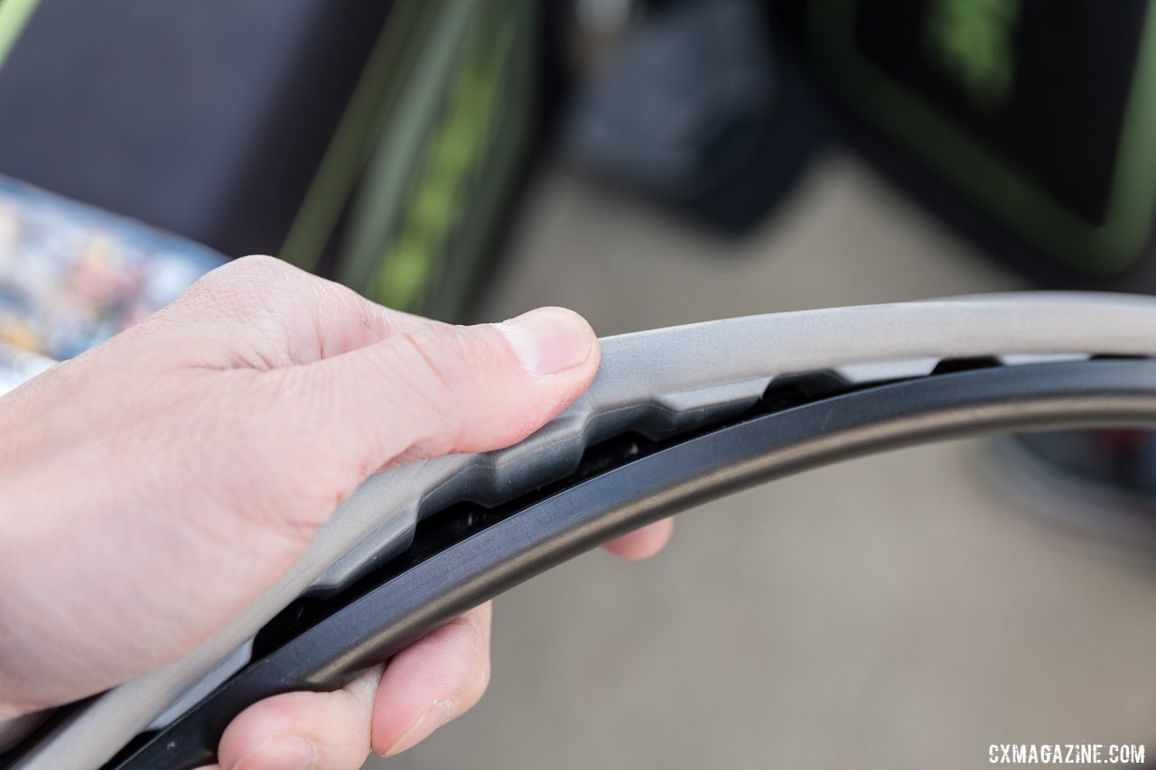 Cushcore demonstrates how the insert fits the rim. Cushcore Gravel Tire Insert, 2019 Sea Otter Classic. © C. Lee / Cyclocross Magazine