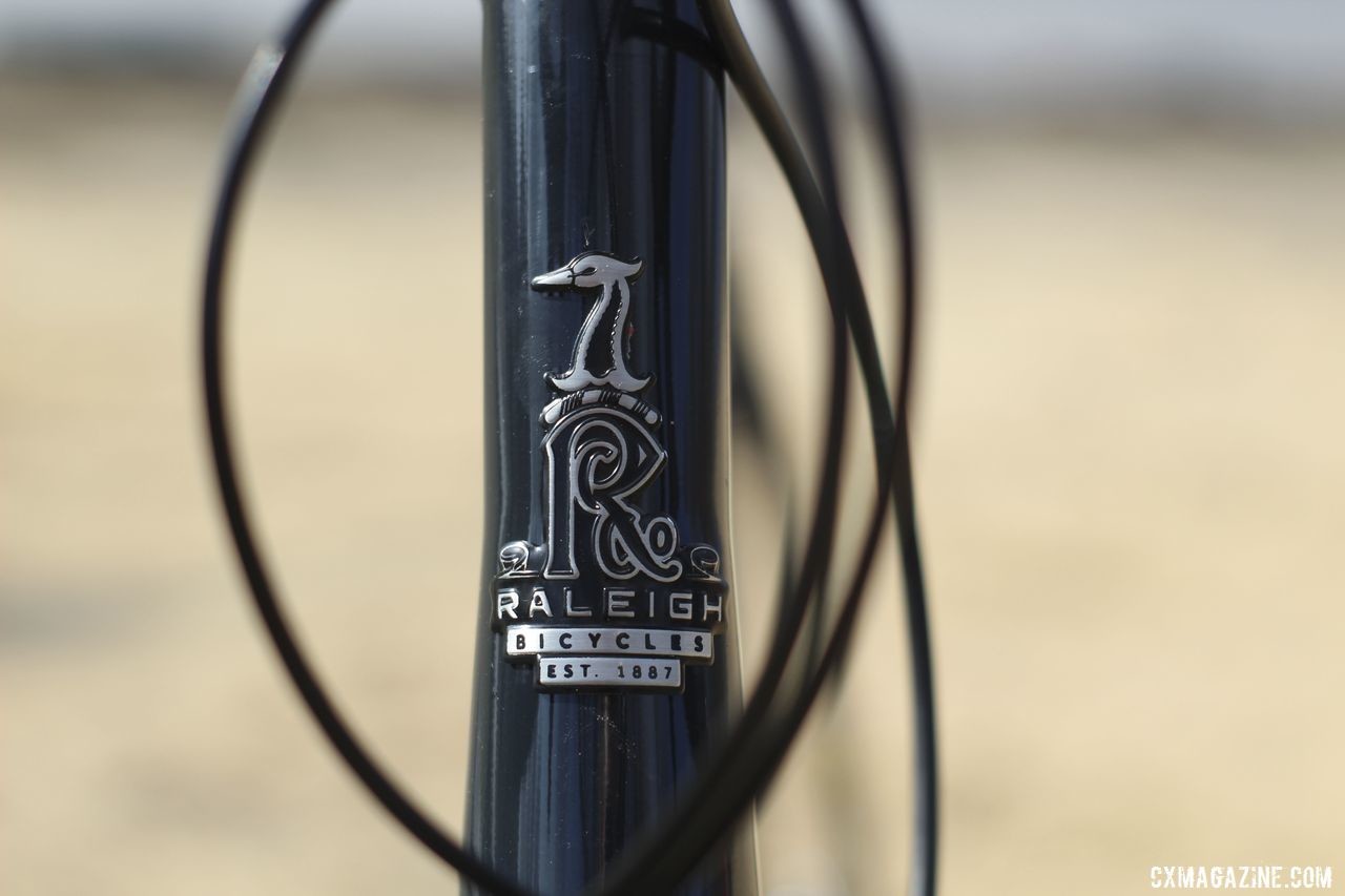 The head tube badge highlights Raleigh's long history in cycling. Raleigh Tamland 1 Steel Gravel Bike. © Z. Schuster / Cyclocross Magazine