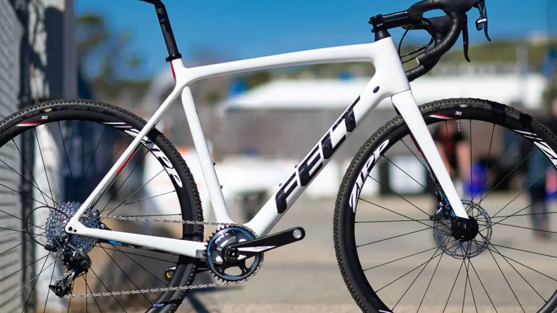 The 2020 Felt Fx | Advanced+ | Force Cx1 cyclocross bike features in white is similar to the white frame Wout van Aert used, but with red and blue accents. The company offers its flagship lighter FRD frame with UHC Extreme carbon as a frameset only. 2019 Sea Otter Classic. © A. Yee / Cyclocross Magazine